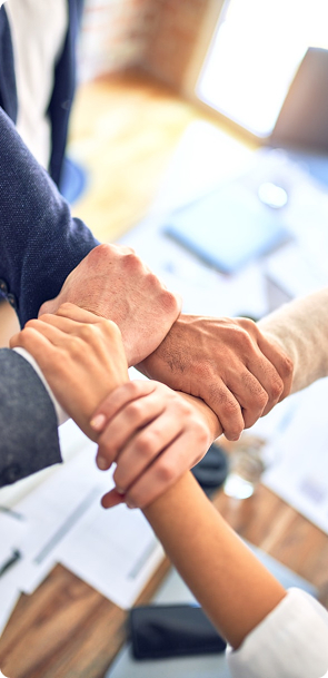 Team hands joined together